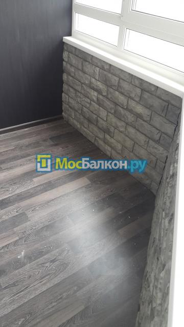 Комбинированная обшивка искусственным камнем 