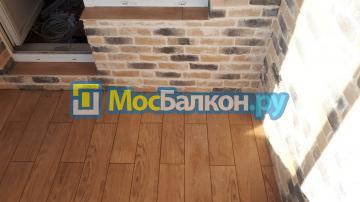 Ремонт лоджии с комбинированной отделкой камнем
