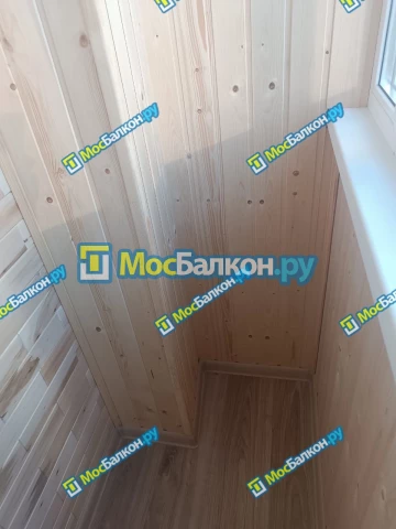 Отделка балконов деревянной вагонкой в Москве
